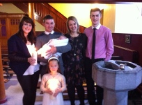 Amelie and Kalia with their parents and godparents on their baptism day.